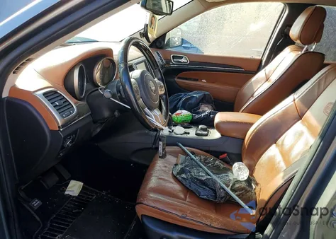 2012 Jeep Grand Cherokee Overland z USA, uszkodzony, nr VIN 1C4RJFCG2CC132275